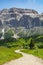 Alpine resort in the Dolomites,Cortina D Ampezzo,South Tyrol,Italy -July 19,2021 : vacationers enjoy the view of the