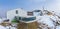 Alpine restaurant and museum on snow covered mountain in alps against sky