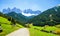 Alpine road with a beautiful view in Santa Maddalena village, Dolomites, Italy