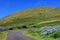 Alpine road on Flores Island in a sunny day