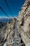 Alpine rope suspension bridge. Sentiero dei fiori, Tonale, Italy