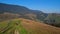 Alpine scene with people riding quad bikes.