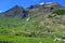 The alpine scenic landscapes of mountains, meadows and flowers at Dondena, Aosta Valley, Italy in natural reserve of Mount Avic