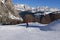 Alpine Skiers Descending a Beautiful Snowy Slope and a view of the Beautiful Surrounding Landscape of the Snow-covered of the