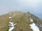 Alpine spring atmosphere with the last remnants of winter and snow on the slopes of the Pilatus mountain range, Alpnach