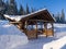 Alpine-style gazebo in a ski resort. Hotel houses in the Siberian camp site