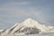 Alpine summit view from slope of ski resort