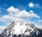 Alpine winter landscape with blue sky