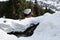 Alpine Wooden House with Huge Snow in Winter