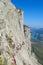 Alpinist in Dolomites via ferrata