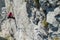 Alpinist in Dolomites via ferrata