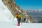 Alpinist rope team on the glacier at high altitude snow mountains