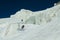 Alpinist rope team on the glacier at high altitude snow mountains