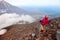 Alpinist on the top of Avachinskiy volcano.