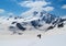 Alpinists tourists on snow mountain