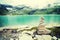 Alps landscape - glacial lake in front of mountains and blue sky