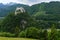 Alps mountain castle summer view