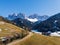 Alps mountain Santa Maddalena village with Dolomites in background, Trentino Alto Adige region, Funes valley, Italy.