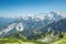 Alps mountains aerial view with paraglider over Alpine landscape