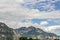 The Alps north of Trento in the Paganella and Mezzocorona area, Trentino, Italy, against a dramatic sky