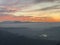 Alps Panorama in fog in winter at sunset with hills and settlements  in the foreground. The view from Uetliber, Zurich Switzerland