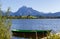 Alps panorama with lake, runway and boat