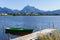 Alps panorama with lake, runway and boat