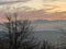 Alps at sunsetseen from Uetliberg in Zurich Switzerland. Trees im on the foreground