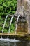 Alsace, a picturesque old fountain in Hunawihr