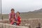 Altai, Mongolia - June 14, 2017: Mongolian woman holds a little girl in her arms