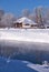 Altai russian country village Talitsa under winter snow on bank