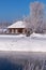 Altai russian country village Talitsa under winter snow on bank of river