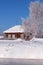 Altai russian country village Talitsa under winter snow on bank of river