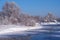 Altai russian country village Talitsa under winter snow on bank of river