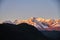 Altai, Snow-capped mountains at sunset. The evening sun shines on the mountains, autumn landscape Altay. Noise and blur