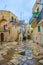 ALTAMURA, ITALY, APRIL 27, 2014: People are strolling through streets in italian city altamura during a medieval