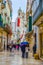 ALTAMURA, ITALY, APRIL 27, 2014: People are strolling through streets in italian city altamura during a medieval