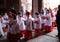 Altar boys enter church during a holy week easter mass in the island of mallorca