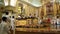Altar boys kneel in the church during mass celebration