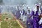 Altar boys swinging censers in Holy Week procession