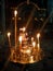 The altar with burning candles stands in the church in front of the icon, gives hope to people, faith and prayer.