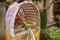 Altar woven from bamboo wicker, covered with white cloth with gold pattern. Offerings to the Gods stored inside a Hindu altar,