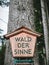 ALTENBERG, AUSTRIA - 05/20/2019: Wooden sign of education trial Forest of Senses
