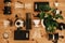 Alternative coffee brewing method set, flat lay. Stylish accessories and items for alternative coffee on wooden table. Kettle,