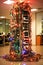 Alternative creative Christmas tree made of computers, technology and garlands. AI generated