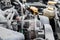 Alternator. Dusty details of a flat-four boxer car engine compartment under the open hood