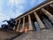 Altes museum with columns towering above. Statue with male figure on horse. Steps leading up to the museum.