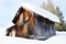 Altitude snow, wooden lodge, winter in Dolomiti mountains, in Cadore, Italy