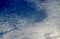 Alto cumulus clouds on a blue summer sky