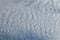 Altocumulus undulatus cloud. Sky with white wavy clouds